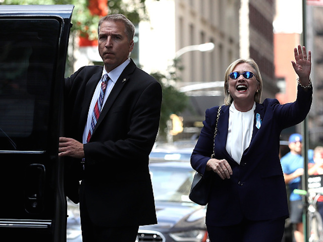 Hillary Clinton leaves 9/11 event due to 'overheating'