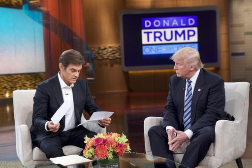 Entertainment shows Dr. Oz left and Republican presidential candidate Donald Trump during a taping of'The Dr. Oz Show' in New York. The show will air on Thursday Sept. 15