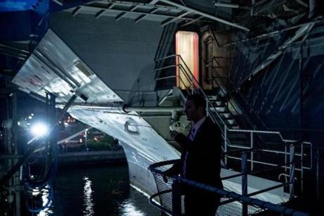 A Secret Service member stands on board the decommissioned aircraft carrier Intrepid as Democratic presidential candidate Hillary Clinton arrives to appear on the:Commander-In-Chief Forum’’ on Wednesday