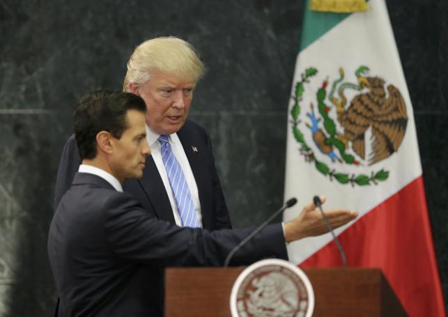 US presidential nominee Trump and Mexico`s president Pena Nieto arrive for a press conference in Mexico City on Wednesday