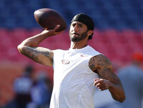 San Francisco 49ers quarterback Colin Kaepernick passes during warmups before a preseason NFL football game against the Denver Broncos in Denver Colo. A northern Nevada airport is getting an earful about a decorat