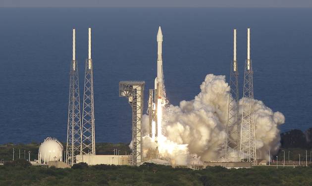 A United Launch Alliance Atlas V rocket carrying the Origins Spectral Interpretation Resource Identification Security Regolith Explorer spacecraft lifts off from launch complex 41 at the Cape Canaveral Air Force Station Thursday Sept. 8