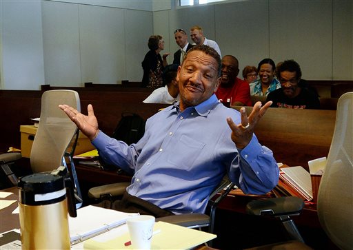 Darryl Howard and his family smile after a judge threw out Howard's conviction in a double-murder case tried 21 years ago and ordered Howard's release because of DNA evidence unavailable at his 1995 murder trial in Durham N.C. Wednesday, Aug. 31 2016