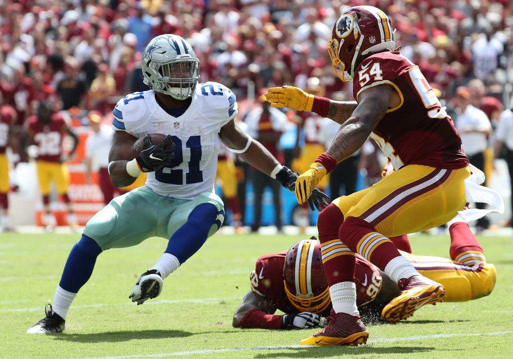 Sep 18 2016 Landover MD USA Dallas Cowboys running back Ezekiel Elliott carries the ball as Washington Redskins linebacker Mason Foster chases in the first quarter at Fed Ex Field. Mandatory Credit Geoff Burke-USA TODAY Sports