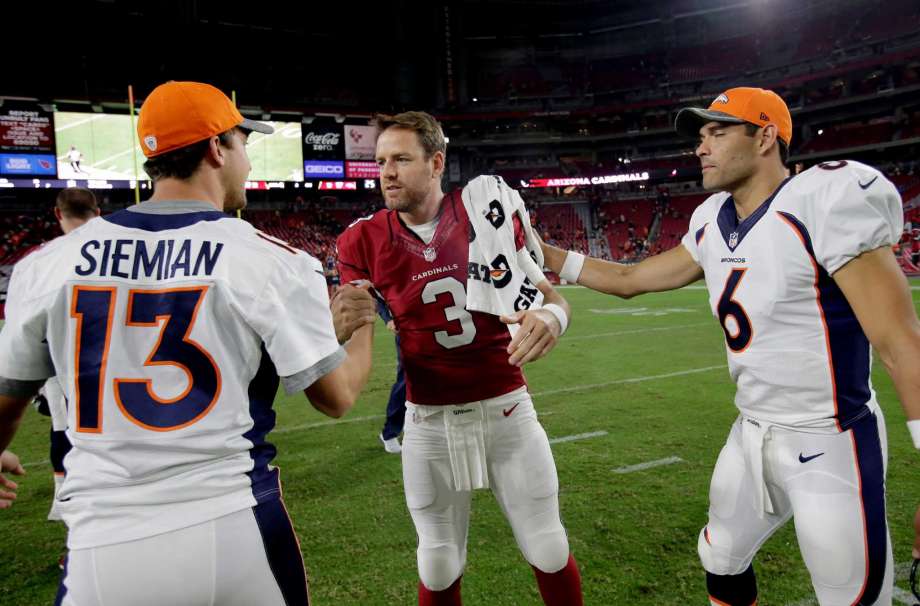 Arizona Cardinals quarterback Carson Palmer, Denver Broncos quarterback Trevor Siemian and Broncos Mark Sanchez meet after an NFL preseason football game Thursday Sept. 1 2016 in Glendale Ariz. The Cardinals won 38-17