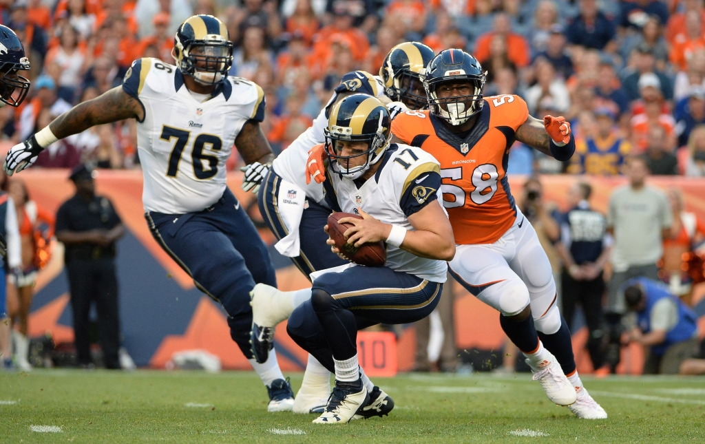 Aug 27 2016 Denver CO USA Denver Broncos outside linebacker Von Miller attempts to sack Los Angeles Rams quarterback Case Keenum during the first quarter of a preseason game at Sports Authority Field at Mile High. Mandatory Credit Ron Chen