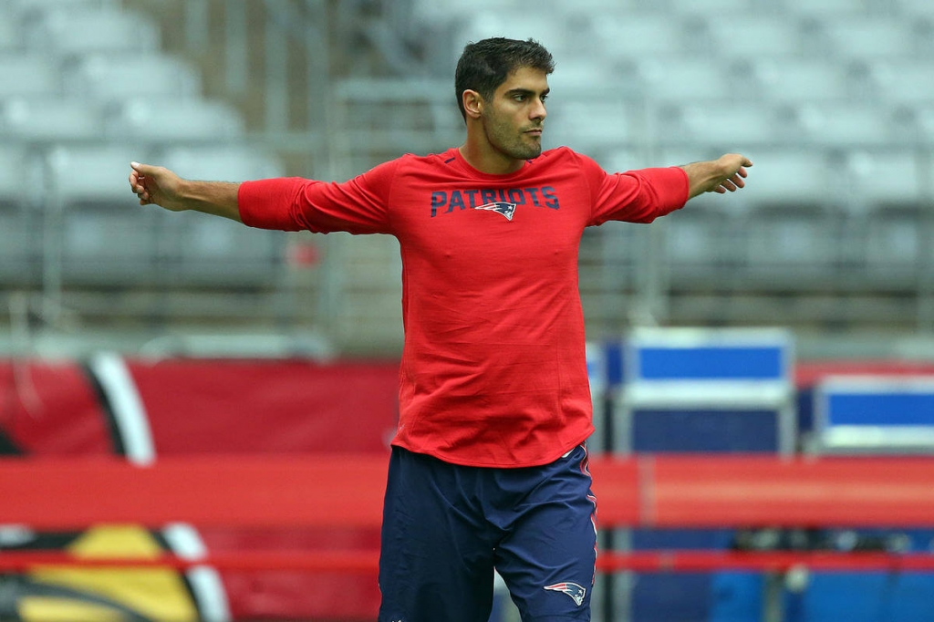 Credit Nancy Lane      Patriots quarterback Jimmy Garoppolo loosens up before the opener against the Cardinals in Arizona