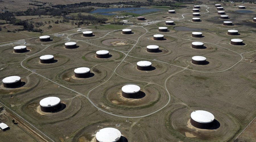 Crude oil storage tanks are seen from above at the Cushing oil hub in Cushing Oklahoma