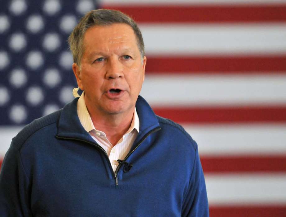 Republican presidential candidate Ohio Gov. John Kasich speaks at a rally in Traverse City Mich. Saturday