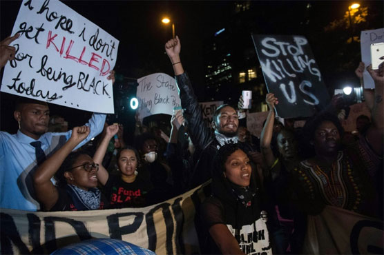 Curfew imposed in US city of Charlotte following protests after fatal police shooting of a black man