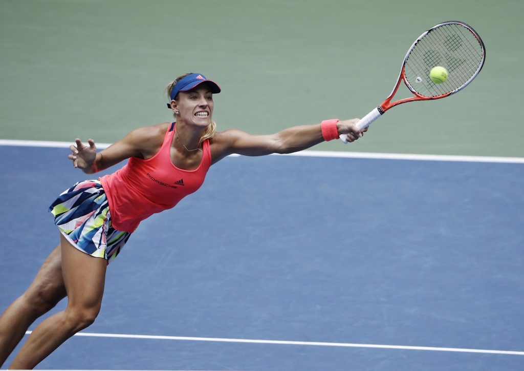 Angelique Kerber of Germany reaches to returns a shot to Karolina Pliskova of the Czech Republic during the women's singles final of the U.S. Open tennis tournament Saturday Sept. 10 2016 in New York