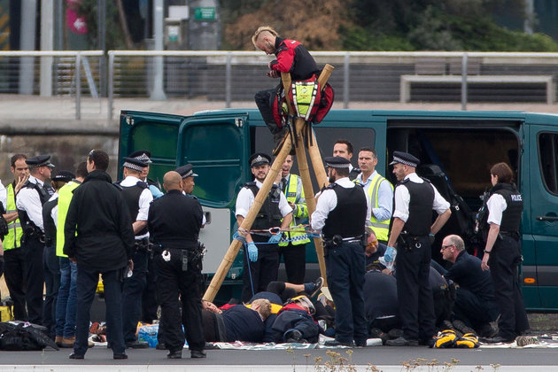 DANIEL LEAL-OLIVAS via Getty Images
The BLM protestors chained themselves to a tripod