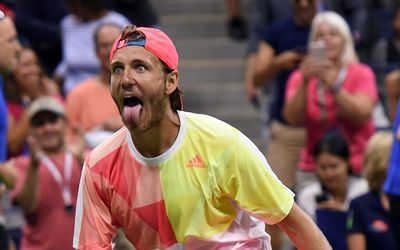 DISBELIEF Frenchman Lucas Pouille celebrates his stunning win over Rafa Nadal in a five-set classic on Sunday