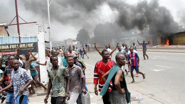 Congolese opposition supporters chant slogans during a march to press President Joseph Kabila to step down in the Democratic Republic of the Congo's capital Kinshasa