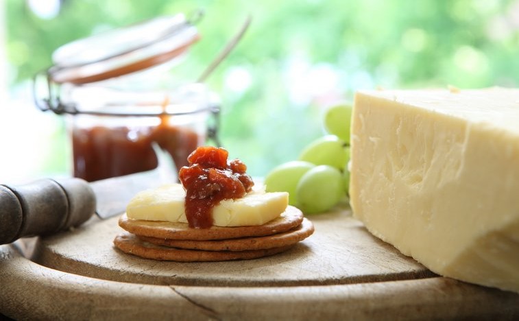 Cheese and biscuits on a board