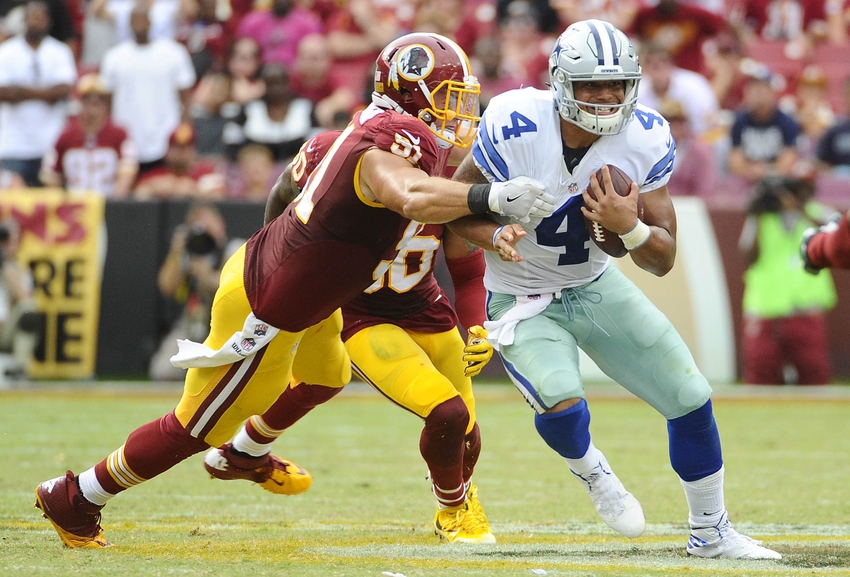 Sep 18 2016 Landover MD USA Dallas Cowboys quarterback Dak Prescott is tackled by Washington Redskins outside linebacker Ryan Kerrigan during the second half at Fed Ex Field. The Dallas Cowboys won 27- 23. Mandatory Credit Brad Mills-USA TO