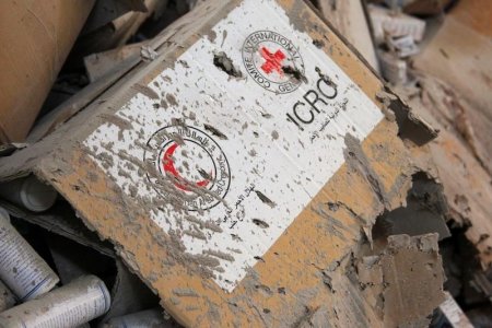 Damaged Red Cross and Red Crescent medical supplies lie inside a warehouse after an airstrike on the rebel held Urm al Kubra town western Aleppo city Syria