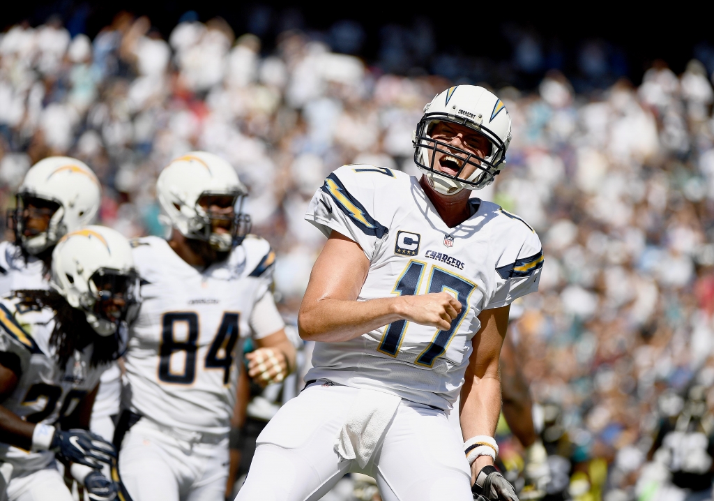 SAN DIEGO CA- SEPTEMBER 18 Quarterback Philip Rivers #17 of the San Diego Chargers celebrates his touchdown pass to Antonio Gates #85 against the Jacksonville Jaguars during the first half of a game at Qualcomm Stadium