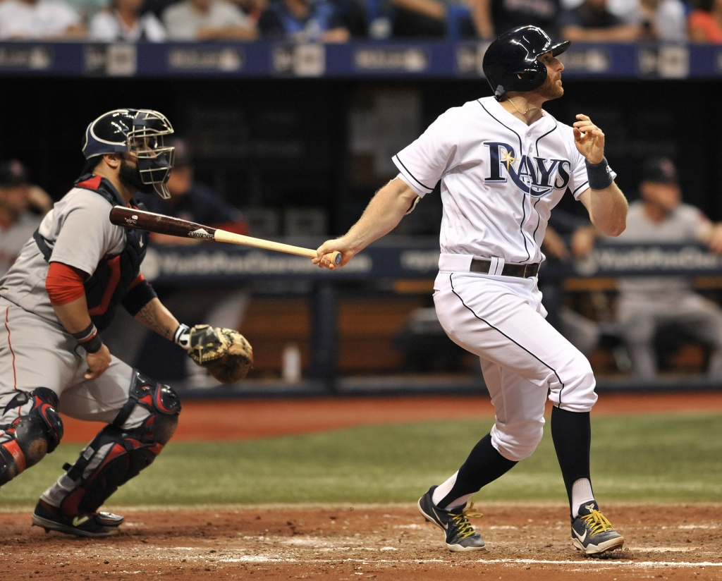 Tampa Bay Rays&#039 Brad Miller watches his two-run double off Boston Red Sox starter Rick Porcello during the third inning of a baseball game Saturday Sept. 24 2016 in St. Petersburg Fla. At left is Boston catcher Sandy Leon