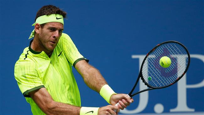 Juan Martin del Potro of Argentina hits a return against Dominic Thiem of Austria during their 2016 US Open Men's Singles match