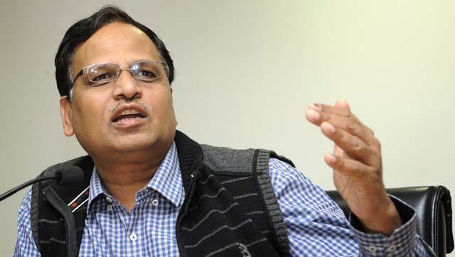 Delhi health minister Satyendar Jain interacts with journalists at his office in Delhi