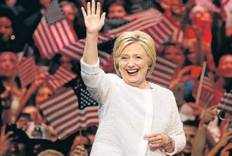 Hillary Clinton celebrates winning her party’s nomination race