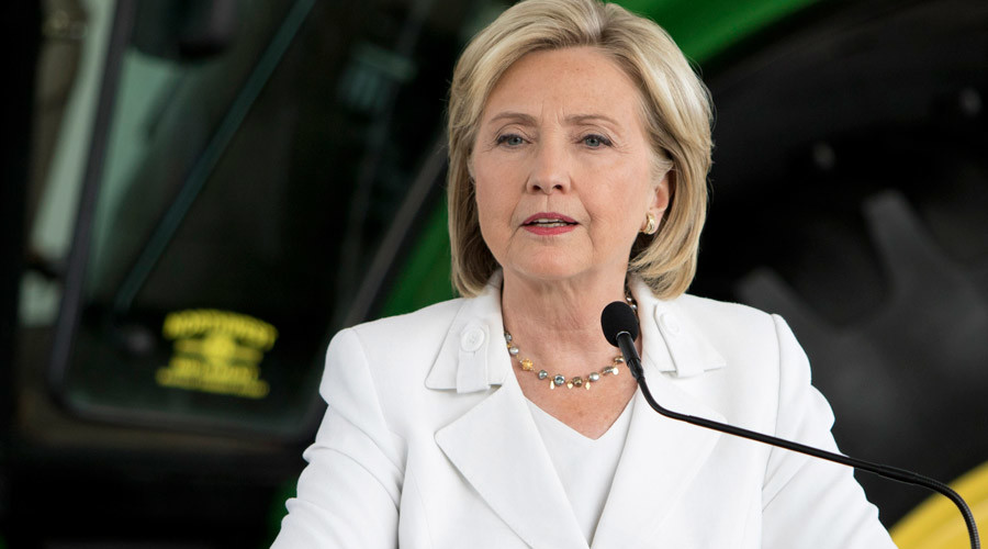 Democratic presidential candidate Hillary Clinton waves after leaving her daughter's apartment on Sunday