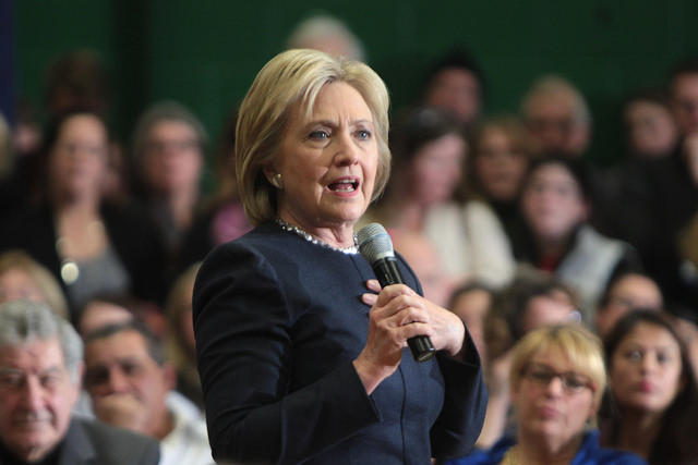 Democratic presidential nominee Hillary Clinton speaks to the press