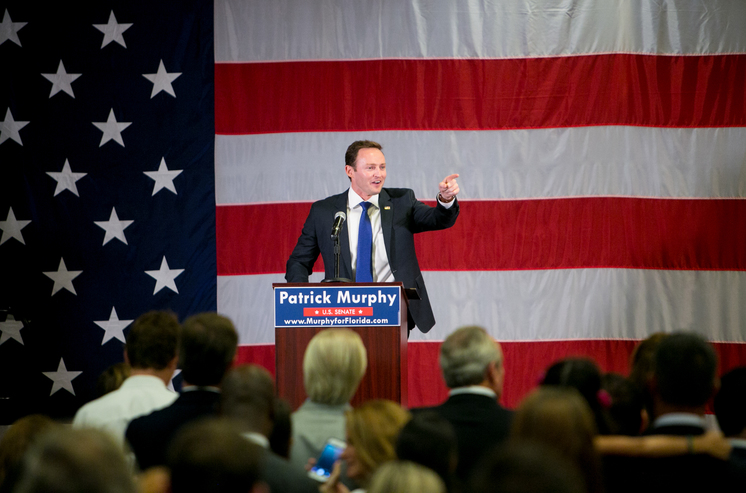 Democratic U.S. Rep. Patrick Murphy celebrates at the Doubletree Hotel in Palm Beach Gardens after he defeated U.S. Rep. Alan Grayson in the state's Senate primary election on Aug. 30