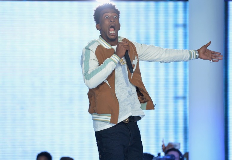 Desiigner performs onstage from the runway during the BET How To Rock Denim show at Milk Studios