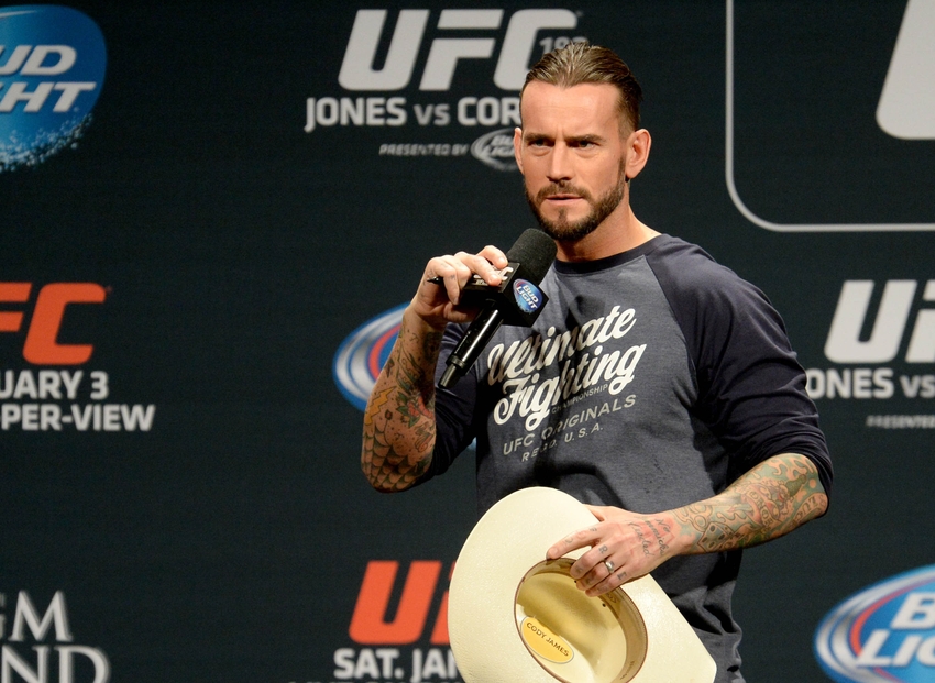 Jan 2 2015 Las Vegas NV USA Former WWE star Phil CM Punk Brooks is the featured guest for the UFC 182 Q&A session Friday evening before the start of the weigh-ins at the MGM Grand Garden Arena. Mandatory Credit Jayne Kamin-Oncea-USA TODAY Sports