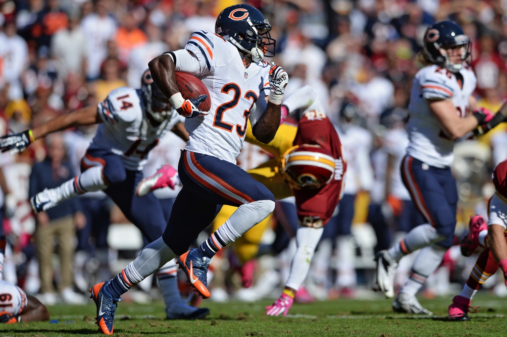 LANDOVER MD- OCTOBER 20 Devin Hester #23 of the Chicago Bears runs a punt back for a touchdown against the Washington Redskins in the second quarter at FedExField