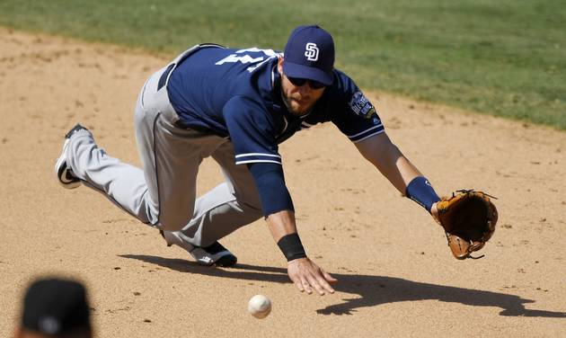 San Diego Padres second baseman Ryan Schimpf cannot reach a ball hit for an RBI-single by Los Angeles Dodgers&#039 Chase Utley during the fifth inning of a baseball game Sunday Sept. 4 2016 in Los Angeles