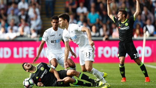 Diego Costa reacts following a challenge against Swansea