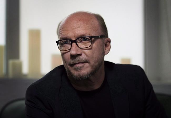 Director Paul Haggis poses in Toronto during the 2014 Toronto International Film Festival