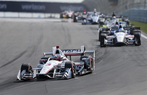 Helio Castroneves of Brazil  leads a group during the Indy Car Grand Prix at The Glen auto race Sunday Sept. 4 2016 in Watkins Glen N.Y