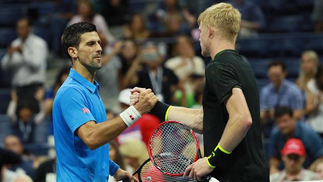 Novak Djokovic of Serbia shakes hands after Kyle Edmund of Britain during his fourth round Men's singles match on day seven of the 2016 US Open at the USTA Billie Jean King National Tennis Center