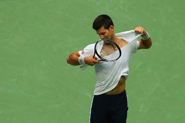 Djokovic rips his shirt in frustration