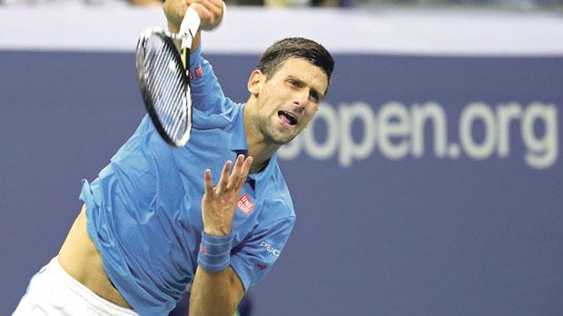 Novak Djokovic hits a shot during his match against Kyle Edmund