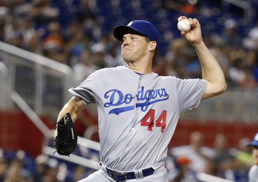 Los Angeles Dodgers Rich Hill delivers a pitch during the first inning of a baseball game against the Miami Marlins Saturday Sept. 10 2016 in Miami