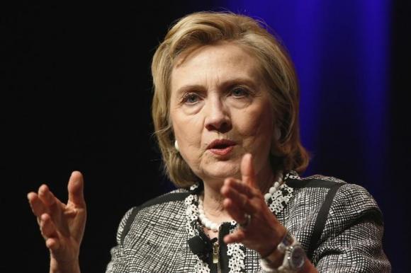 Clinton reacts to a question as she discusses her new book'Hard Choices at George Washington University in Washington