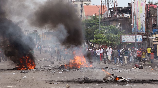 Protests turn violent in Congo capital, police officer lynched