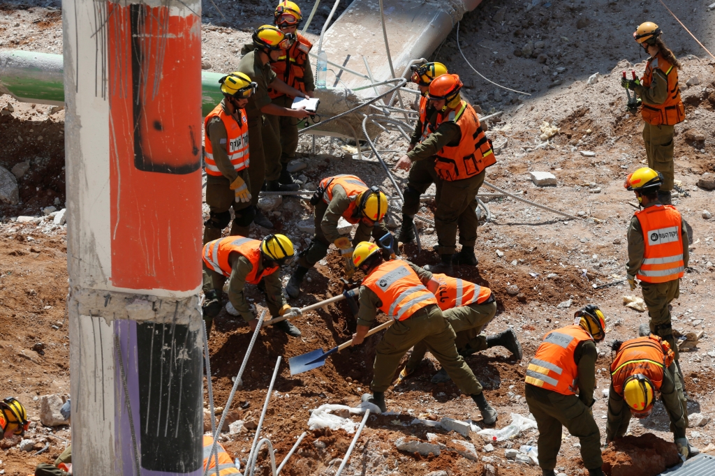 Dozens of workers were inside a multistorey car park in Tel Aviv when it collapsed burying them Nir Elias  Reuters