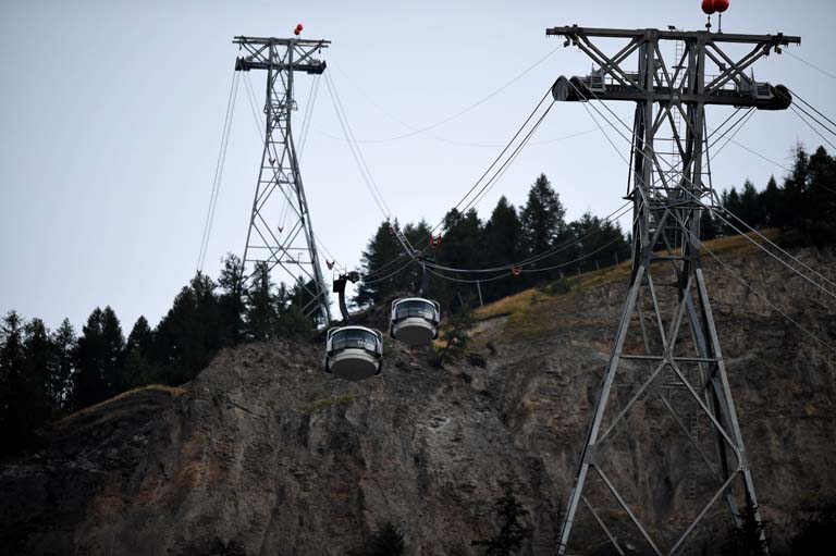 9 2016 shows the Mont Blanc cable car'Skyway in Courmayeur. Cable cars that were stuck overnight thousands of metres up among the glaciers of Mont Blanc with some 30 tourists on board were restarted