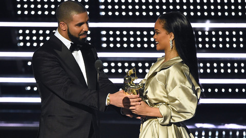 Drake left presents the Michael Jackson Video Vanguard Award to Rihanna at the MTV Video Music Awards