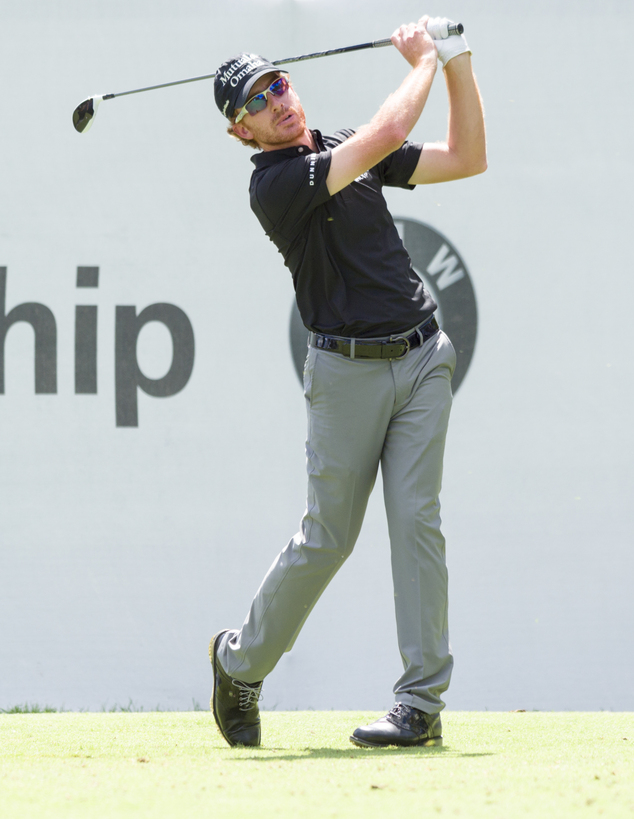 Roberto Castro tees off from the first tee box during the final round of the BMW Championship golf tournament at Crooked Stick Golf Club in Carmel Ind. Sun