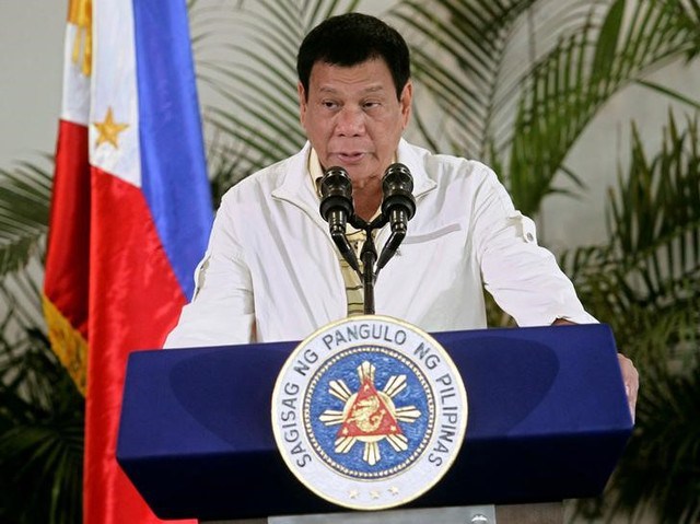 Philippines President Rodrigo Duterte delivers his pre-departure message before leaving for the Association of Southeast Asian Nations Summit in Laos at the Davao International Airport in Davao city Philippines