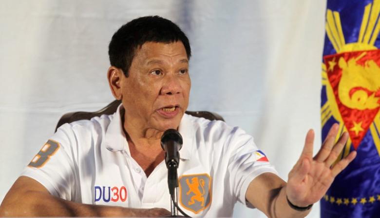 Philippine President Rodrigo Duterte speaks during a news conference in Davao city southern Philippines