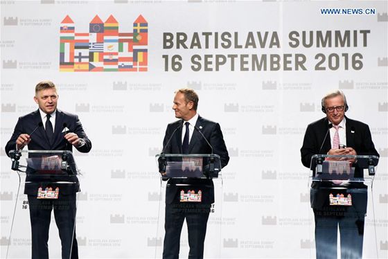 Slovak Prime Minister Robert Fico European Council President Donald Tusk and European Commission President Jean Claude Juncker attend a press conference after the informal EU summit held in Bratislava Slovakia Sept. 16 2016