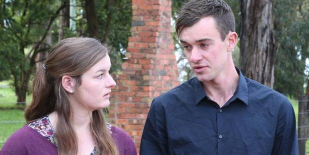 Ella and Mitchell Tromp at a press conference on a property in Silvan after their missing father Mark was found near Wangaratta